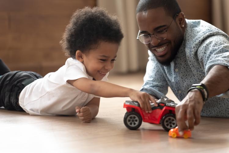 Father and son playing