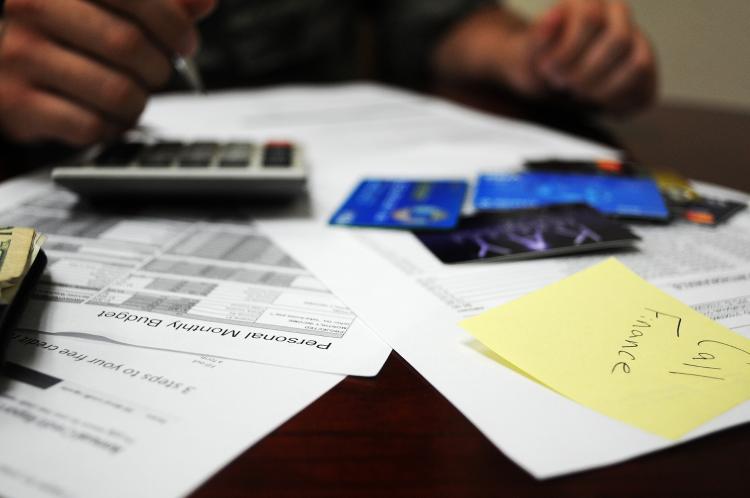 bills and credit cards on a table