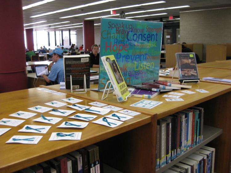 Library book showcase sexual assault awareness month. Photo courtesy of college.library, Flickr