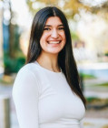 Headshot of Maxy Grasso smiling 
