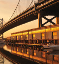 View from under Benjamin Franklin Bridge with sun setting