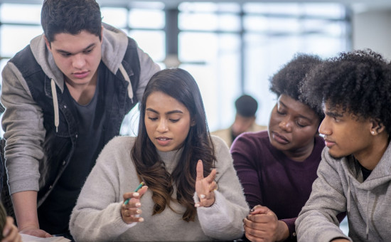 Multi-ethnic students working together
