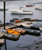 Row boats and small fishing boats on a harbor in Maine